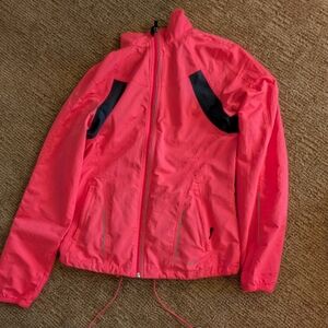 Brooks Women's Vibrant Pink Jacket with Black Accents And Reflective Decals